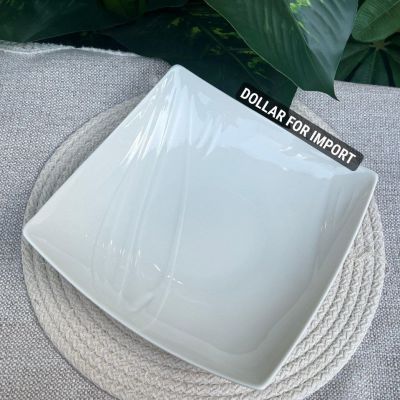 طبق بورسلين فتحي محمود الحراري مربع مسطح للتقديم 🍽️   مقاس 23 سم، مثالي لتقديم الحلويات أو المقبلات أو أي حاجة تحبيها، شكله شيك وهيضيف لمسة راقية للترابيزة ✨   Dollars for impor